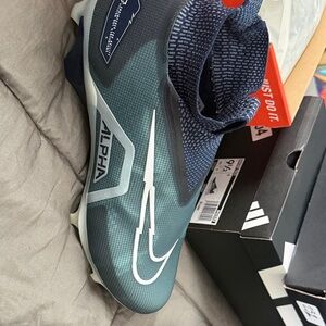 Nike Alpha Cleats in Teal and Navy with White Swoosh